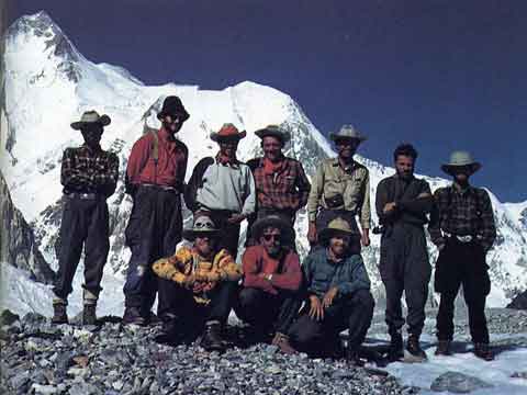 Gasherbrum I book -
The expedition poses in front of Gasherbrum I (Hidden Peak) at Base Camp after the first ascent in 1958.
Behind the team is Gasherbrum I (Hidden Peak) above the Abrruzzi Glacier. The summit on the left, Hidden South in the middle, and the Roch ridge used by the expedition on the far right.
Front, left to right: Bob Swift, Tom Nevison, Dick Irvin. Rear: Mohd Akram, Gil Roberts, Ras Rizvi, Pete Schoening, Nick Clinch, Andy Kauffman, Tom McCormack. - A Walk In The Sky book
- A Walk In The Sky book
